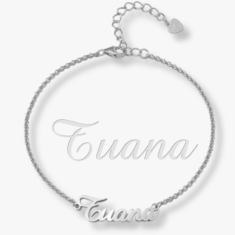 Personalized sterling silver name bracelet with decorative script "Tuana".