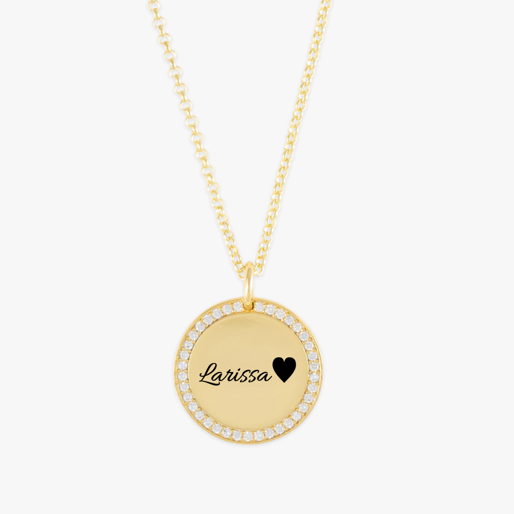 Crystal-Encrusted Name Medallion Necklace in gold with customizable pendant "Larissa" and heart, adorned with cubic zirconia crystals.