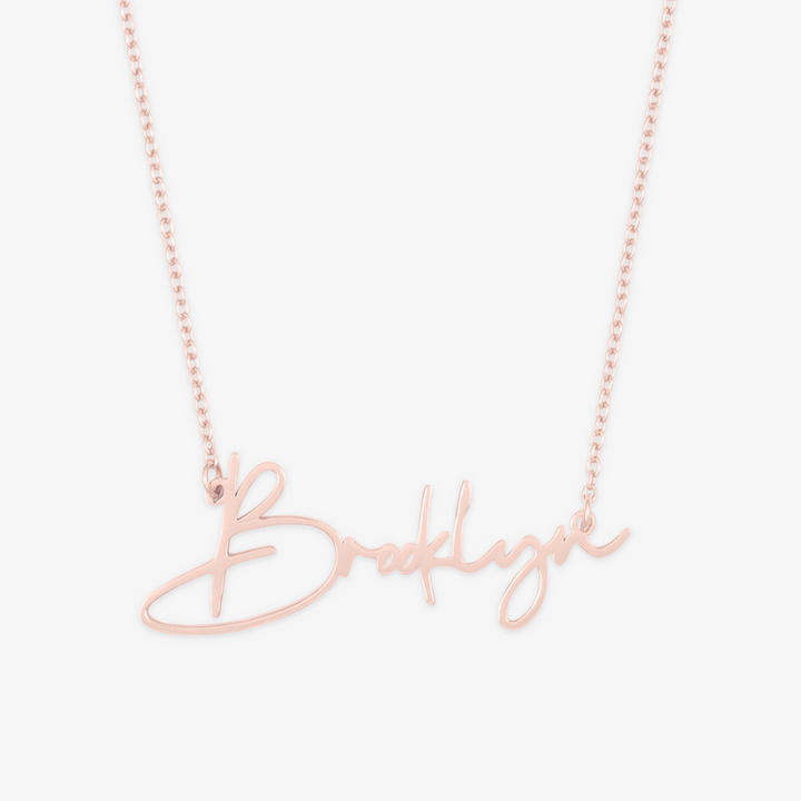 Brooklyn Style Name Necklace with bold urban font on a delicate chain, showcasing personalized flair and individuality.