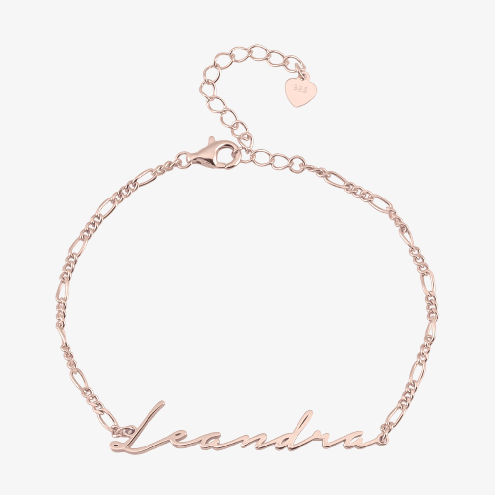 Rose gold Figaro Signature Name Bracelet made from 925 Sterling Silver with personalized name "Leandra" in stylish signature font.