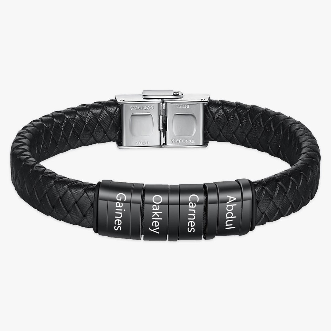 Customizable men's black faux leather bracelet with four engraved stainless steel rings in black.