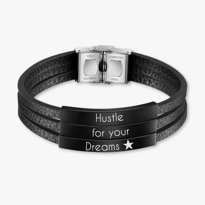 Customizable black leather bracelet with three engravings, high-quality stainless steel clasp, and "Hustle for your Dreams" engraved text.