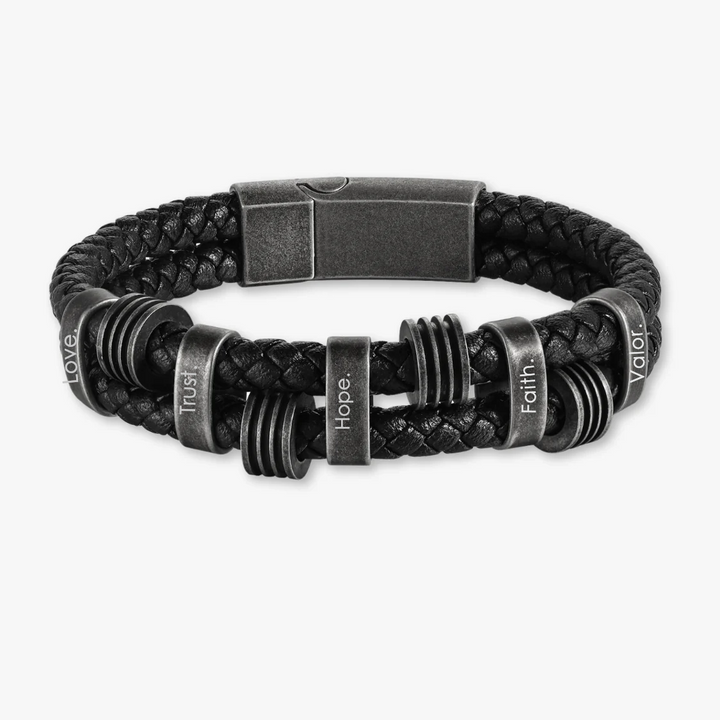 Personalized black braided leather bracelet with dark grey stainless steel rings and five engravings “Love”, “Trust”, “Hope”, “Faith”, “Valor”