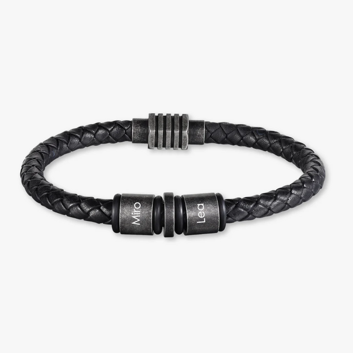 Simple vintage black braided leather bracelet with two customizable stainless steel engraving rings.