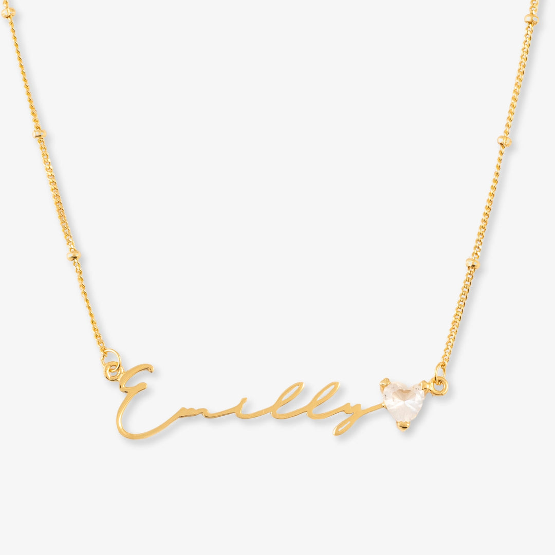 18K gold signature name necklace with birthstone in 925 sterling silver, featuring elegant lettering and a personalized birthstone gem.