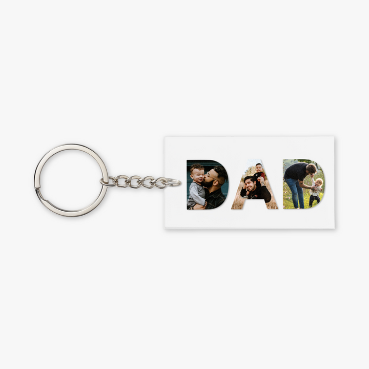 Custom 'DAD' photo keychain with personalized white picture charms for fathers, featuring three photos in acrylic letters D, A, and D