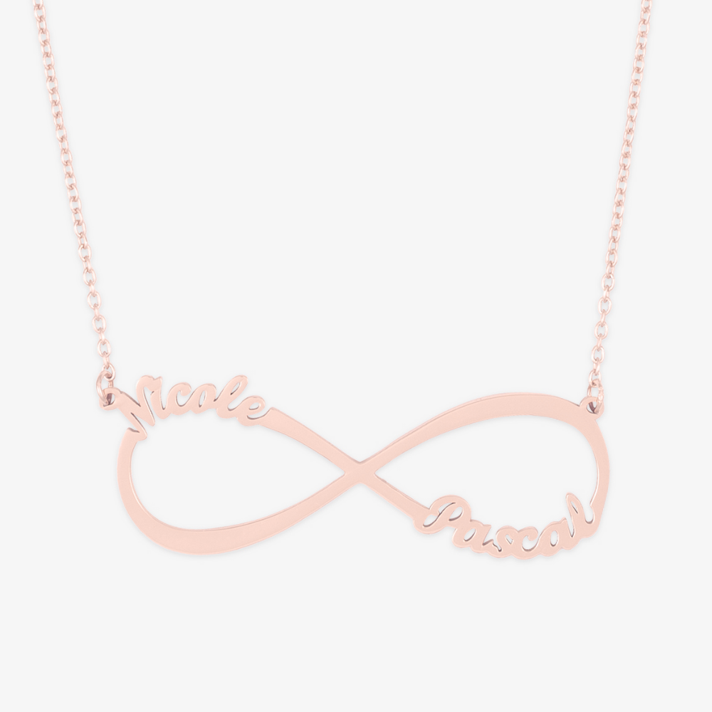 Personalized Infinity Name Necklace in Sterling Silver with Nicole and Pascal names on an infinity symbol