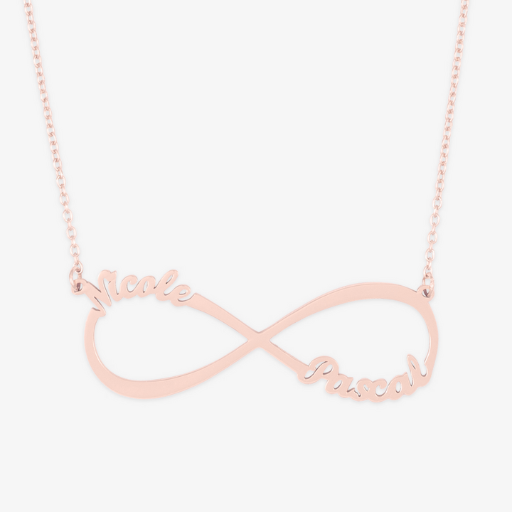 Personalized Infinity Name Necklace in Sterling Silver with Nicole and Pascal names on an infinity symbol