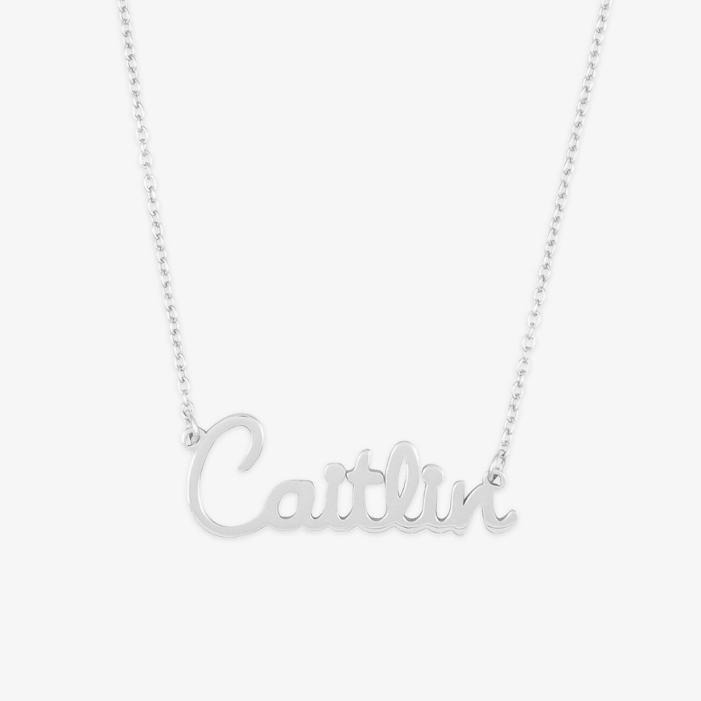 Elegant cursive name necklace in sterling silver with the name Caitlin, showcasing playful elegance and delicate craftsmanship.