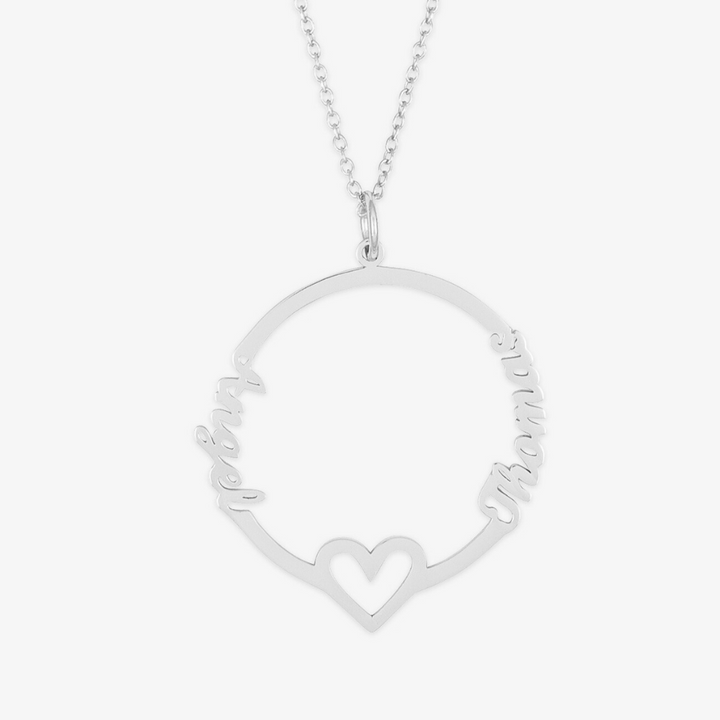 Circular dual-name necklace with central heart symbol, personalized jewelry with two names on round open pendant, symbolizing love and unity.