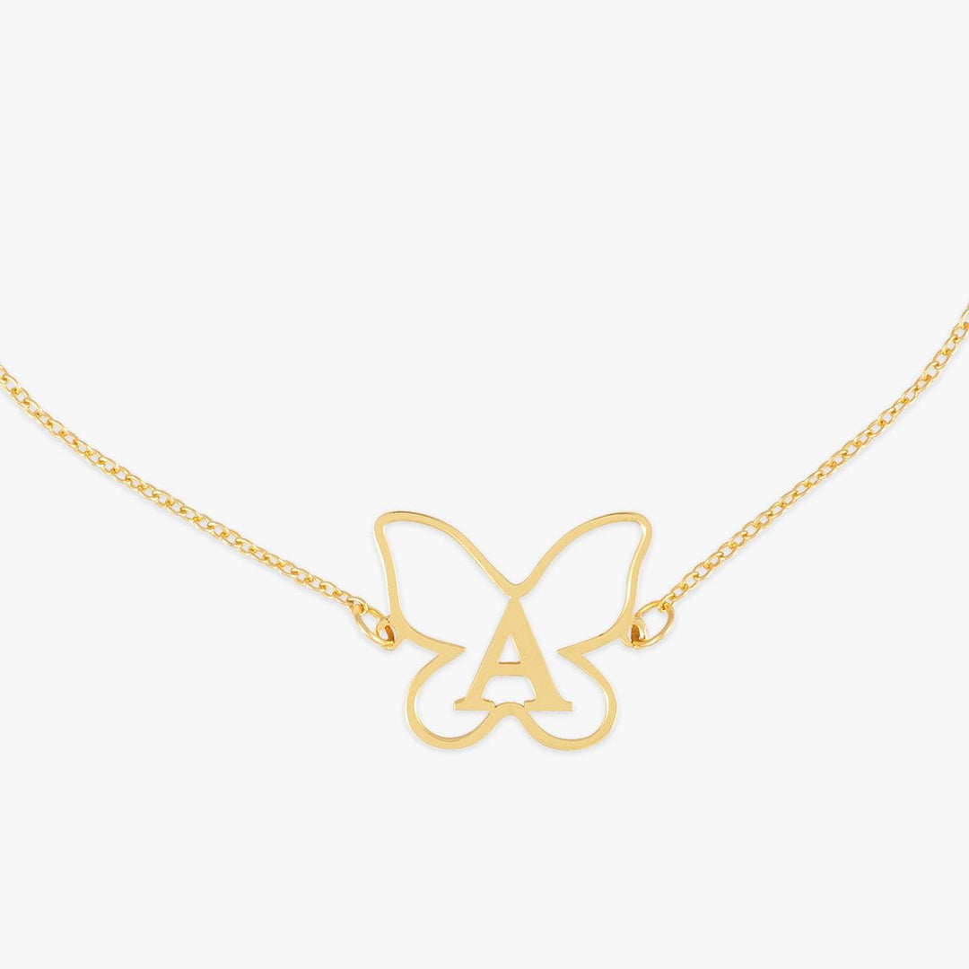 Gold butterfly necklace with personalized letter charm in the center. Elegant and unique jewelry piece made with high-quality 925 sterling silver.