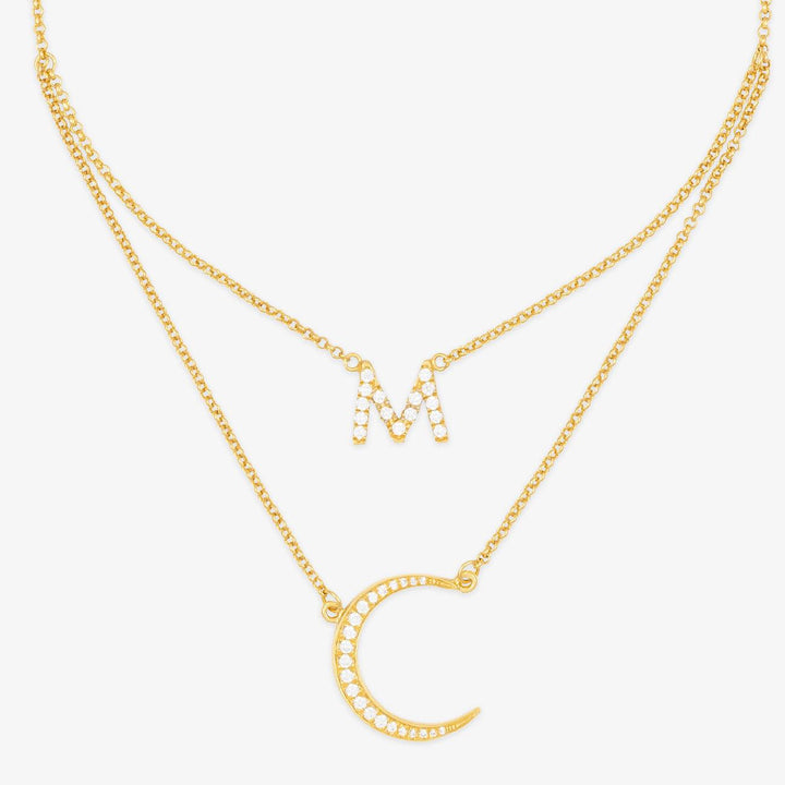 Customized half-moon necklace in 925 sterling silver with the initial 'M' pendant.