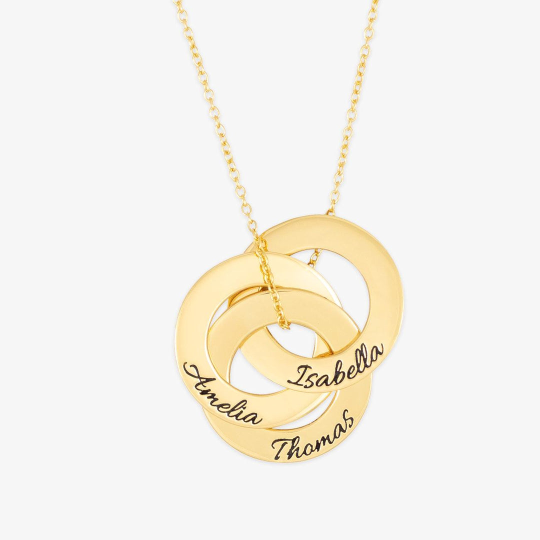 Gold Eternal Trinity Circle Necklace with engraved names "Amelia", "Isabella", and "Thomas" on interlocking rings of 925 Sterling Silver.