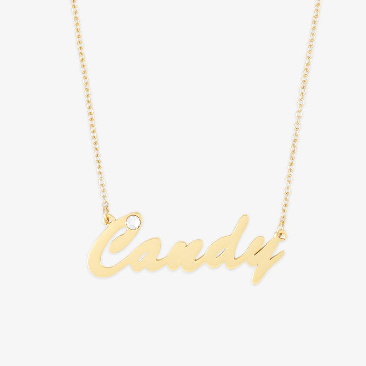 Candy Style Name Necklace with zirconia stone in gold cursive font on a chain