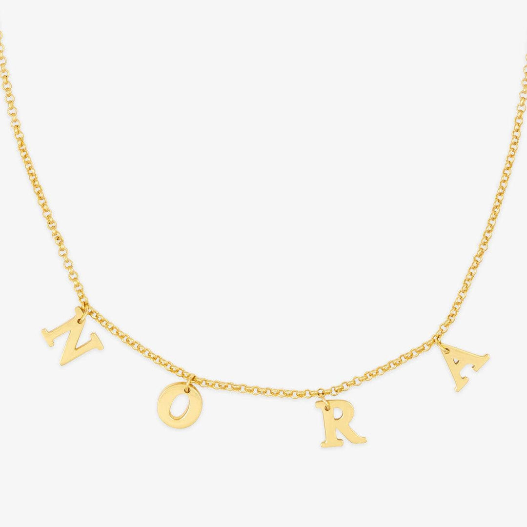 Gold letter choker necklace displaying letters in a dainty design on a chain. 925 sterling silver, color options: gold, silver, rose gold.