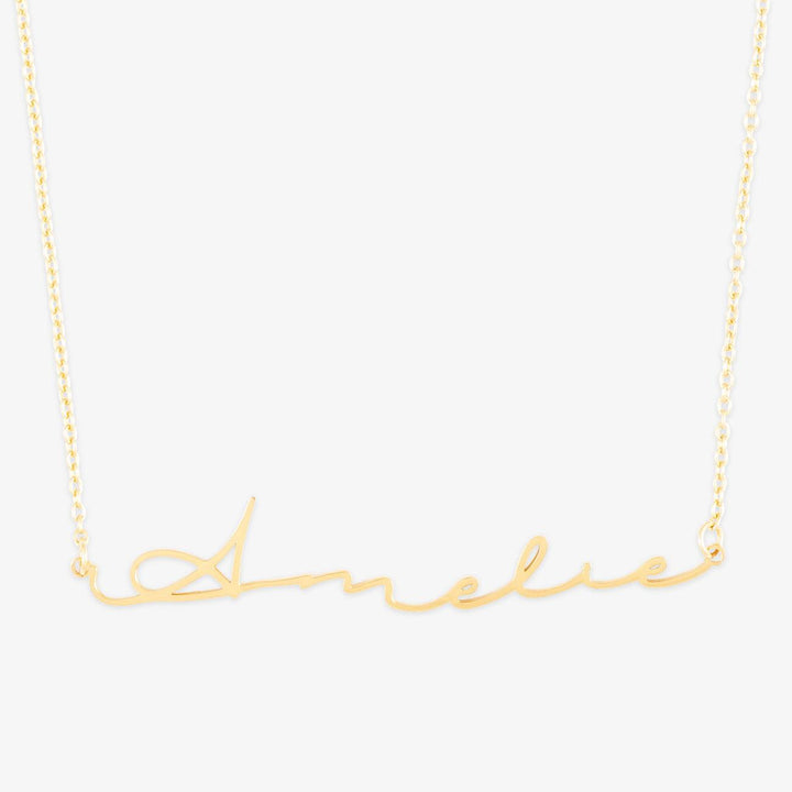 Signature script name necklace in 14 Karat gold personalized with Amelie, simple and elegant everyday accessory.