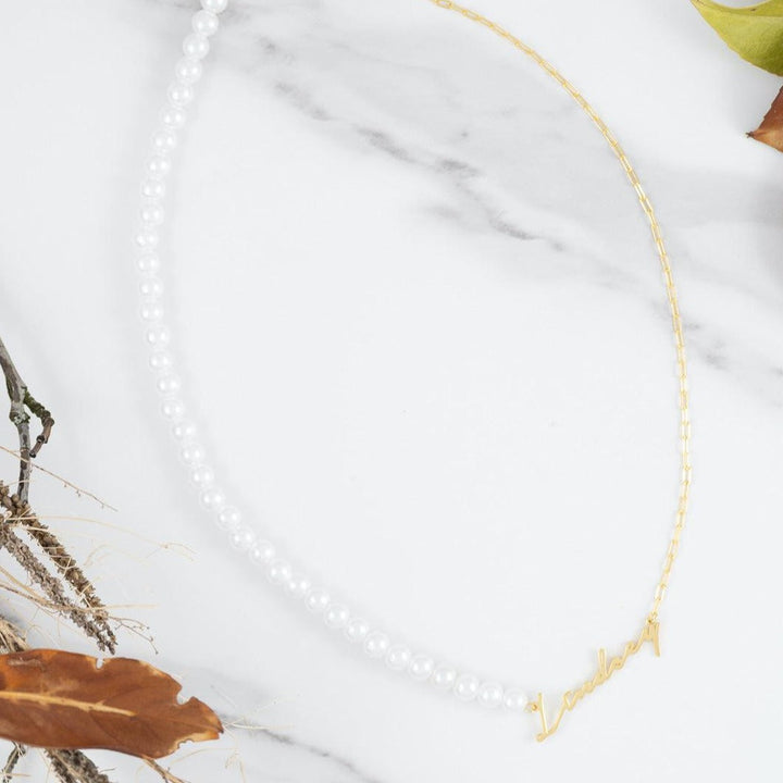 Elegant Signature Name Necklace with Pearl and Link Chain on Marble Background. Available in 925 Sterling Silver, Gold, and Rose Gold.